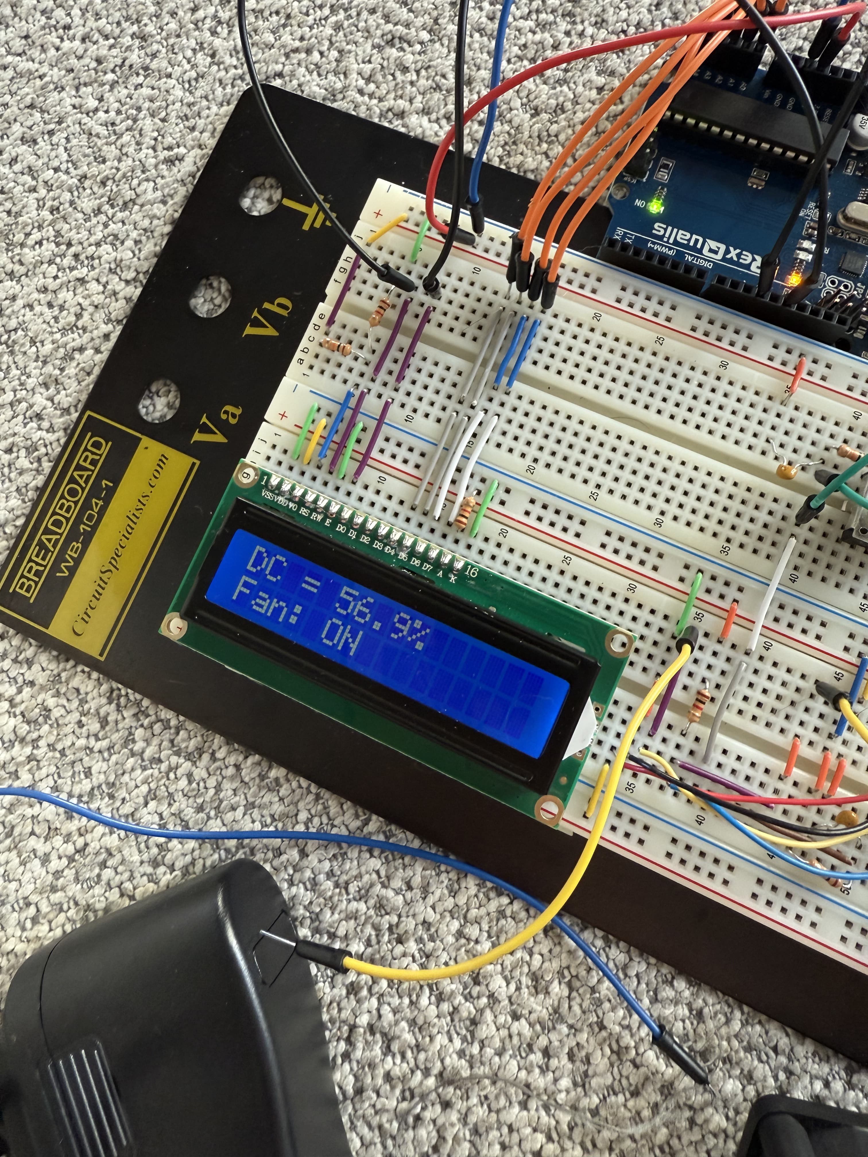 PWM fan controller showing duty-cycle and fan status on an LCD